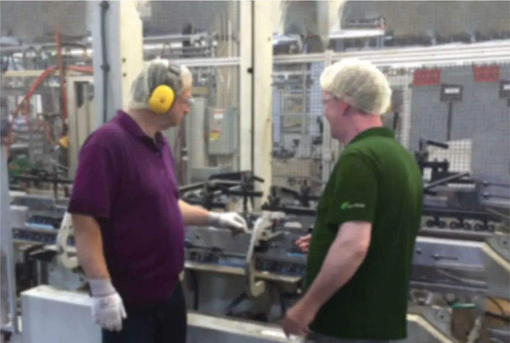 two workers in manufacturing