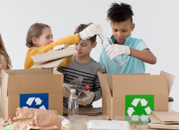Kids sorting recycling